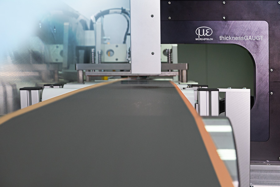 Inline-tjockleksmätning av bandmaterial